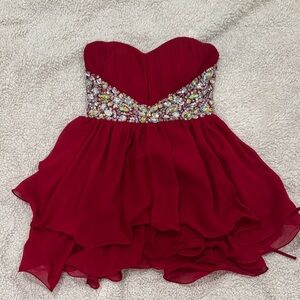 Elegant Strapless Red Dress with Gem Embellishments